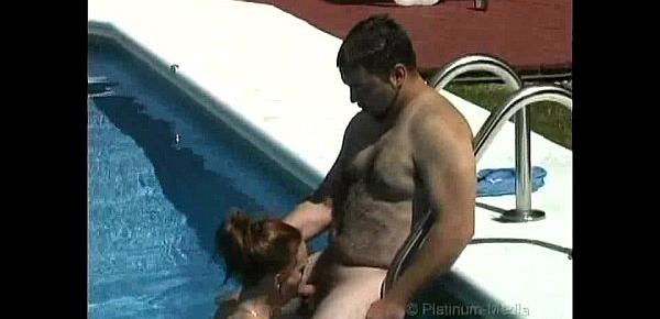  Milf gives blowjob on big hard cock outdoors in pool